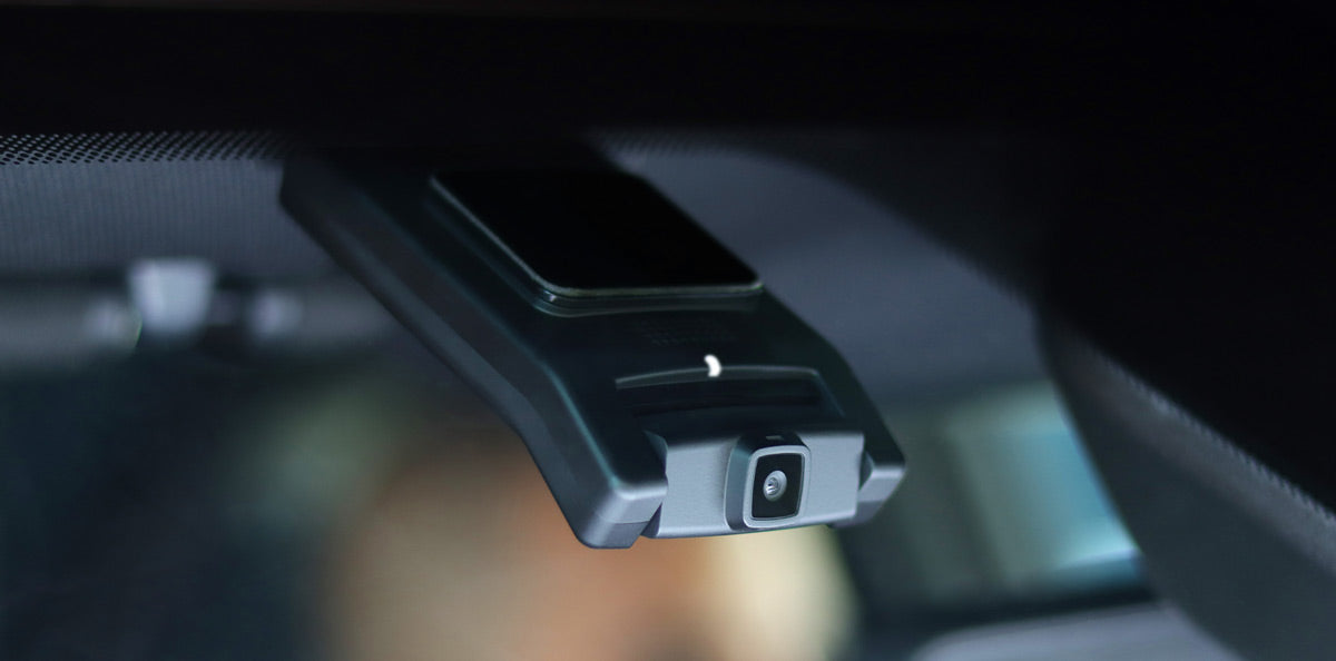 Momento M8 front camera installed near the windshield headliner